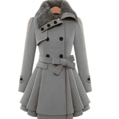 The Women's Winter Slim Long Wool Sherpa Coat is a double-breasted, padded, and England-style trench coat.