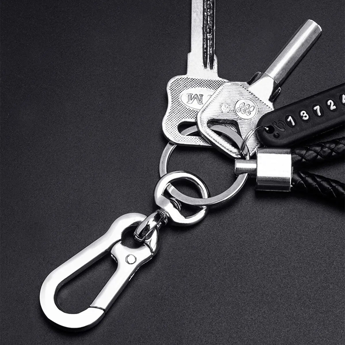 Trendy DIY mobile phone number plate keychain for men in punk style with woven leather rope. Perfect anti-lost accessory.