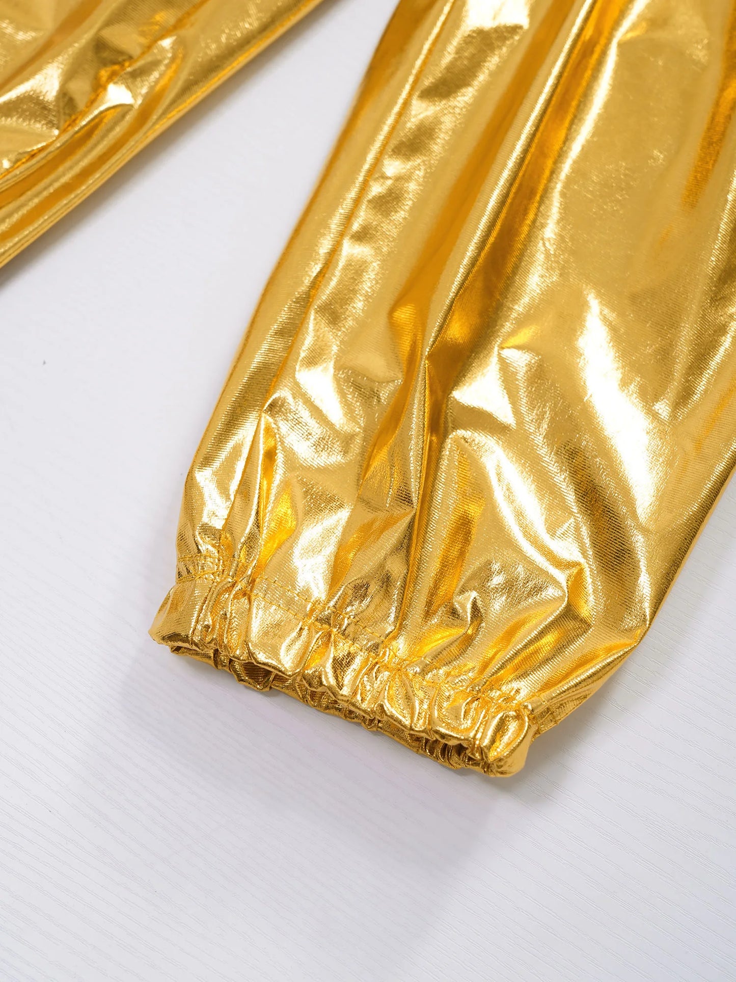 Kids' shiny metallic harem pants with an elastic waistband for jazz dance, hip hop, and stage performances.