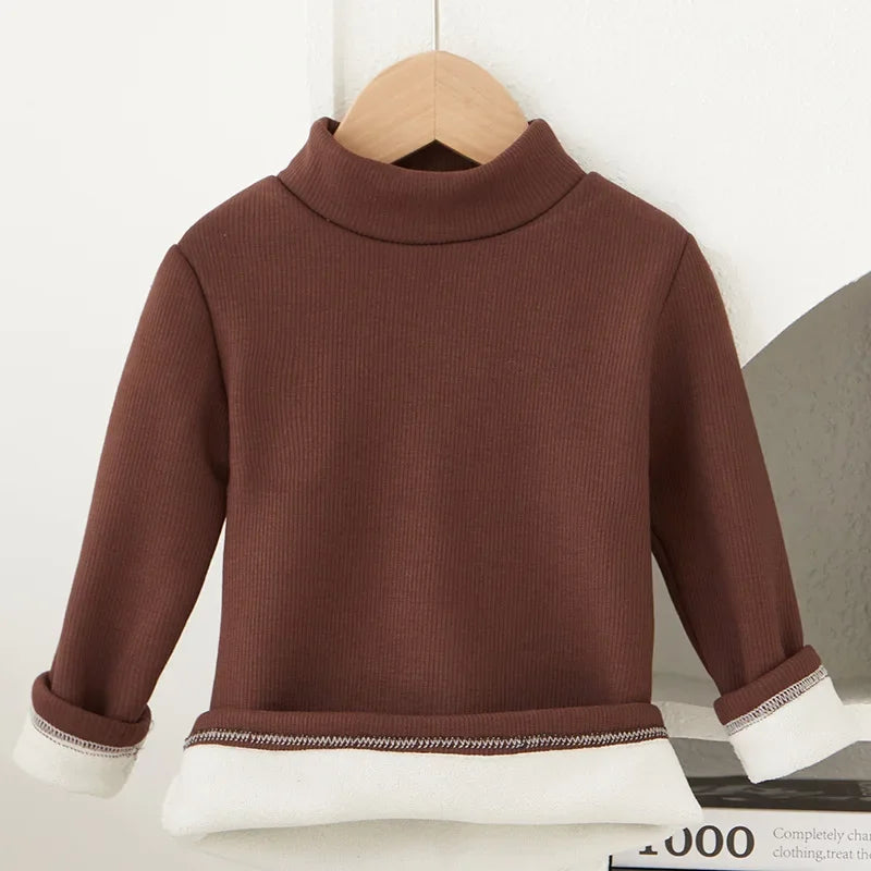 This versatile and stylish children's long-sleeved T-shirt with a half-high collar is perfect for boys and girls during autumn/winter.