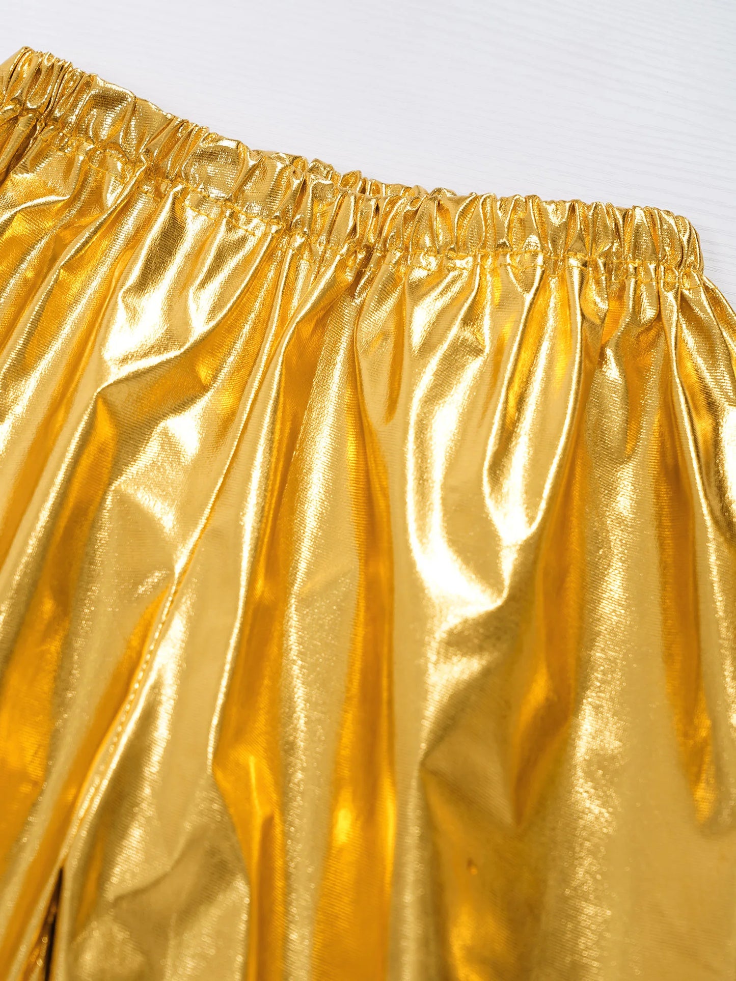 Kids' shiny metallic harem pants with an elastic waistband for jazz dance, hip hop, and stage performances.