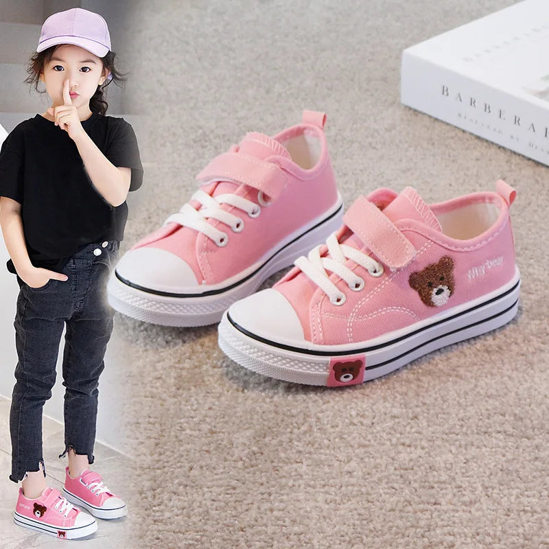 set of children's canvas shoes, specifically designed for girls and boys, featuring a cartoon bear design for a soft-bottomed casual sneaker.