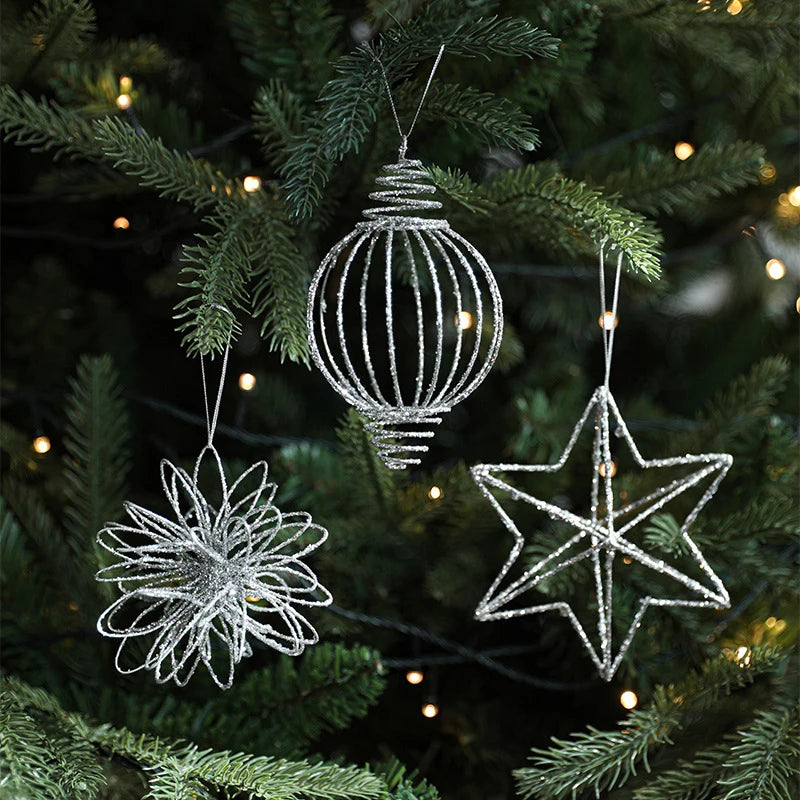 The silver glitter star pendant Christmas decorations, featuring hollow star hanging ornaments, are perfect for Christmas trees and New Year home decor gifts.