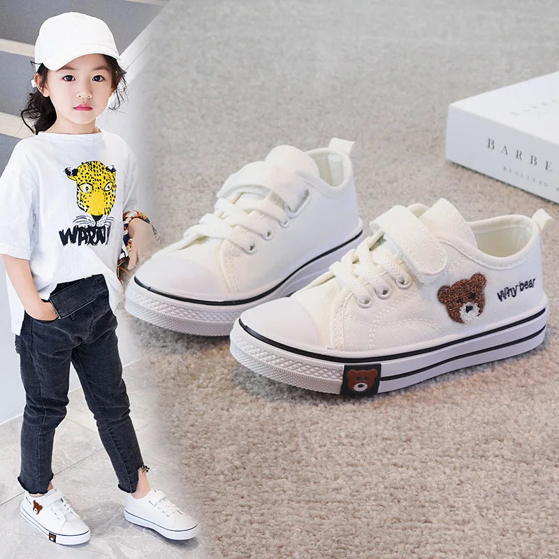 set of children's canvas shoes, specifically designed for girls and boys, featuring a cartoon bear design for a soft-bottomed casual sneaker.