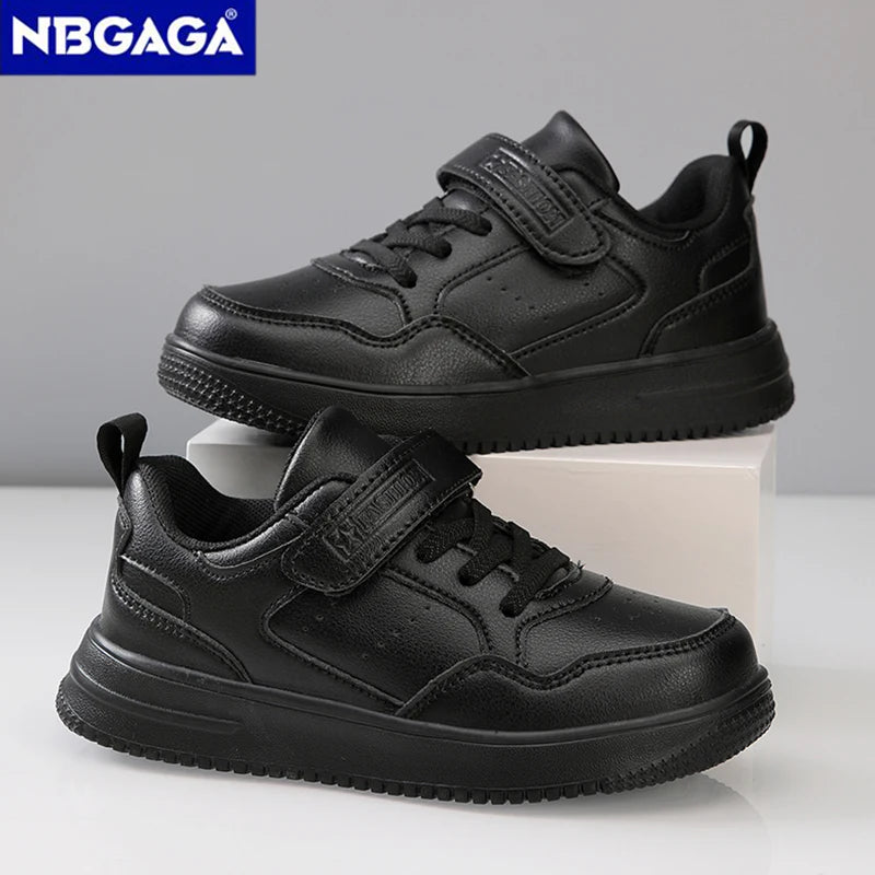 pair of lightweight, non-slip, children's sneaker shoes made of black leather for casual wear.