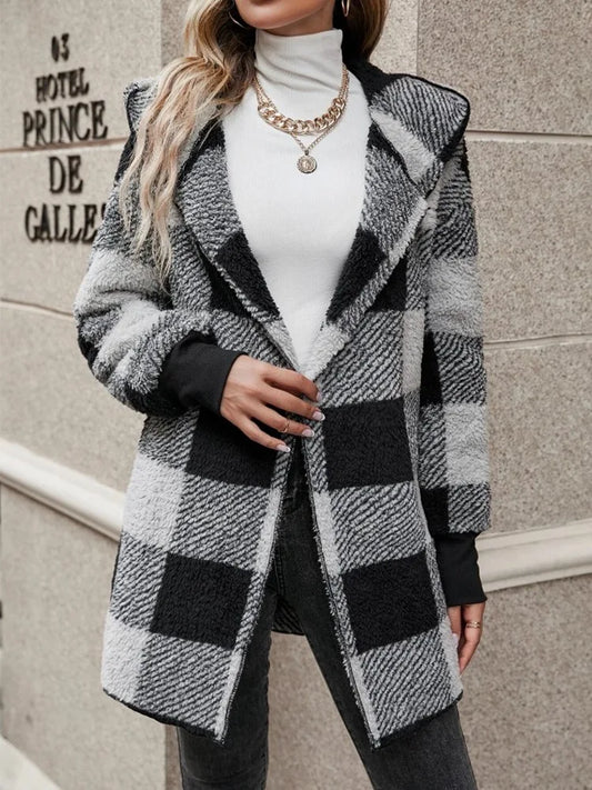 The Elegant Plaid Flannel Jacket Coat is a fashionable and stylish choice for women during the autumn and winter season, perfect for casual wear and loose jackets.