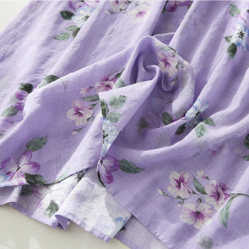 Purple Maxi Dress for women. It features a flower print, vintage style, high waist, and turn-down neck.