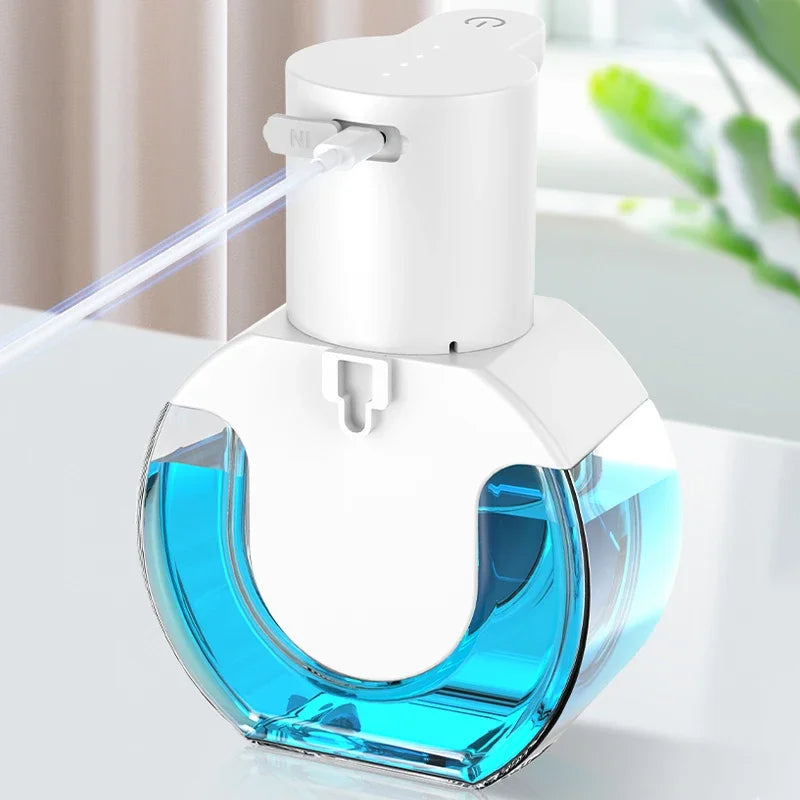 Touchless soap dispenser for easy hand washing at home with foam or alcohol spray.