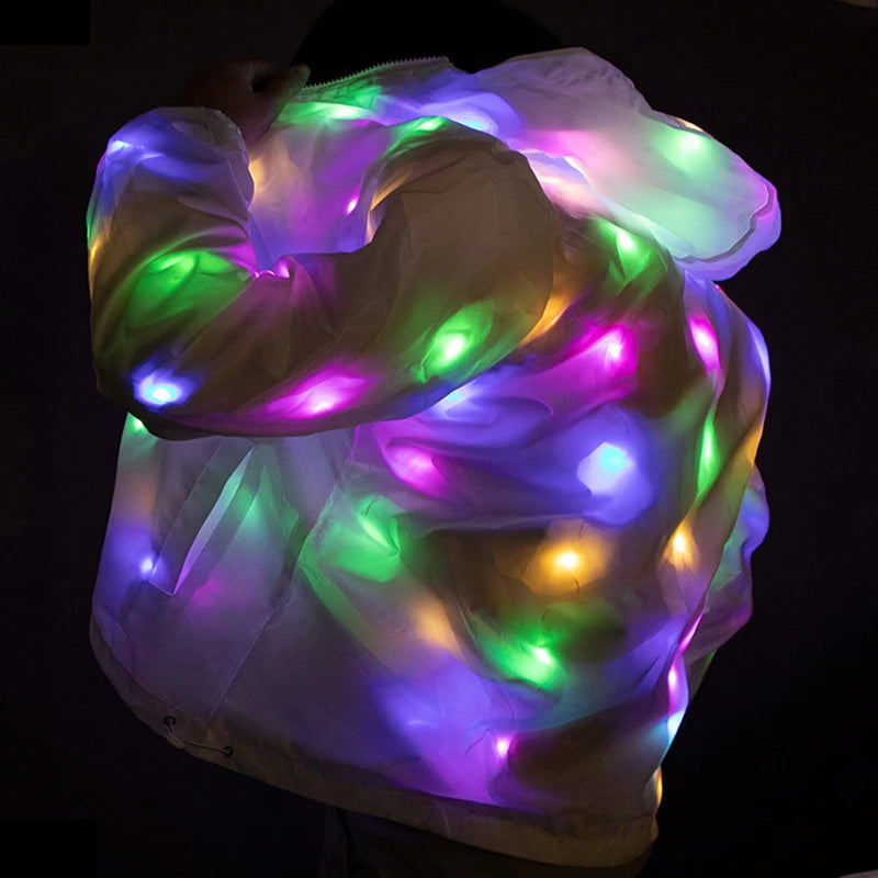 LED Light Up Rave Jacket for Adults and Kids. Perfect for dance performances and fancy dress. Features flashing LED lights and is waterproof, making it great for night runs and fun events!