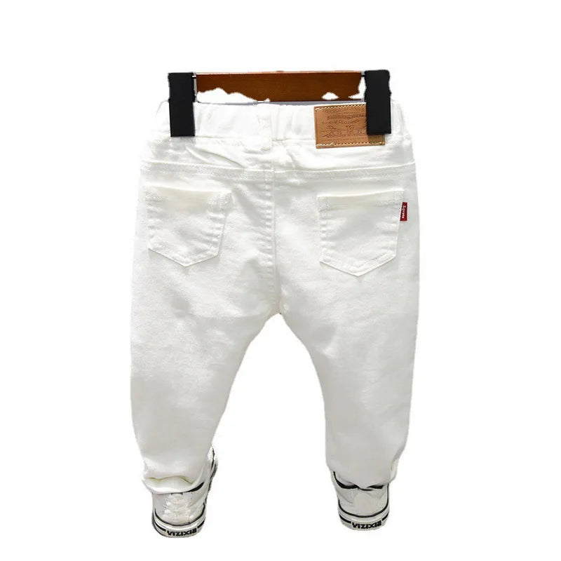 Children's Pants from Chorus Clothing in Pure White and Black. Straight jeans for students. Comfortable trousers for baby boys, perfect for Latin dance.